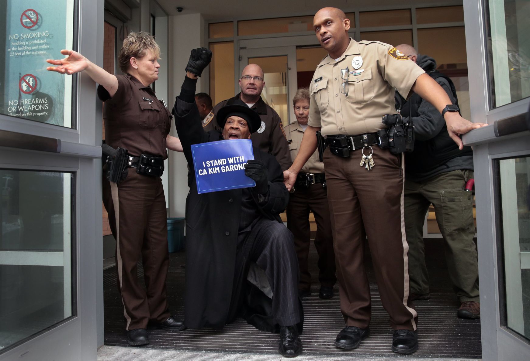 Protesters march in Clayton as St. Louis circuit attorney arrives for deposition